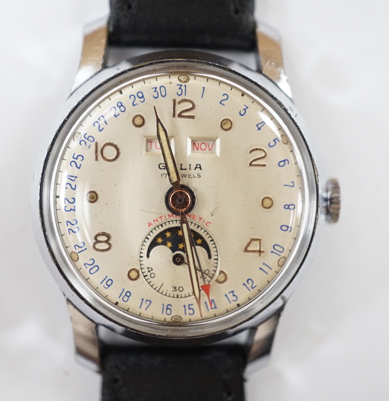 A gentleman's 1950's? stainless steel Galia calendar moonphase manual wind wrist watch, on an associated leather strap, case diameter 32mm.